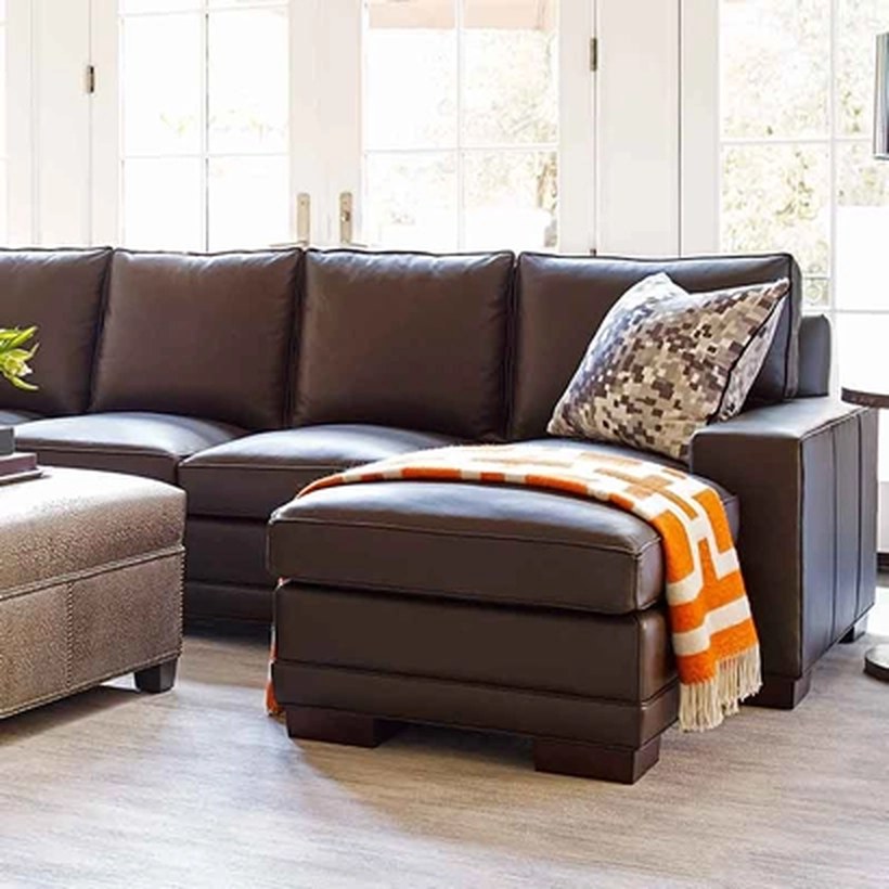 A Hancock and Moore brown leather sectional